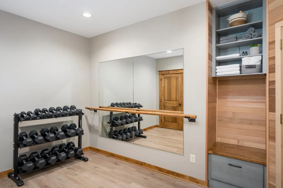 Fitness Center and Relaxation Area by Wise Design & Remodel LLC - Photo 6