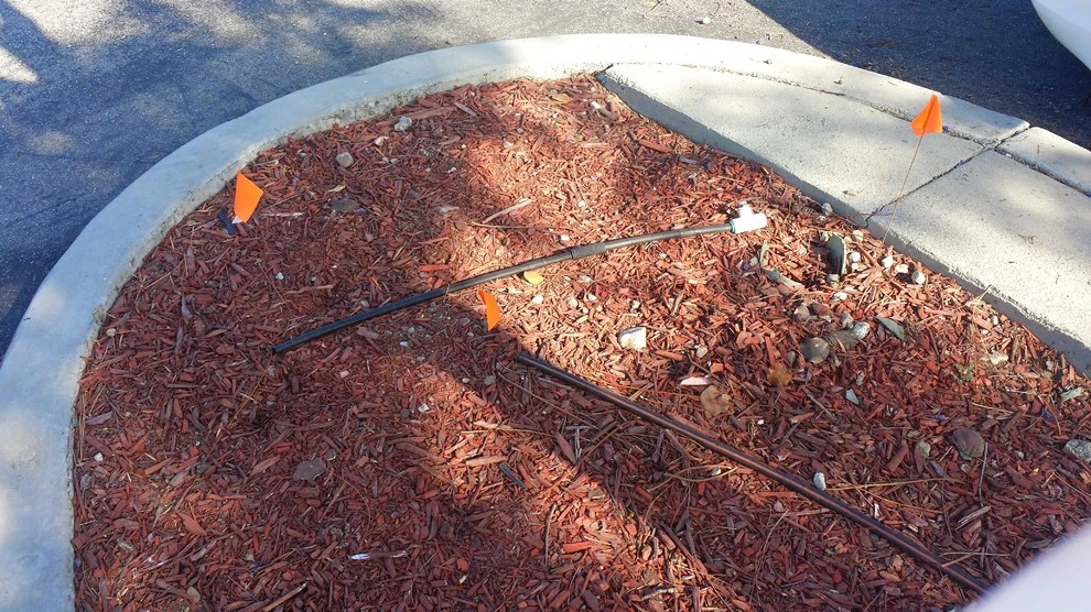 sprinkler repair by Krueger Property Investments - Photo 4