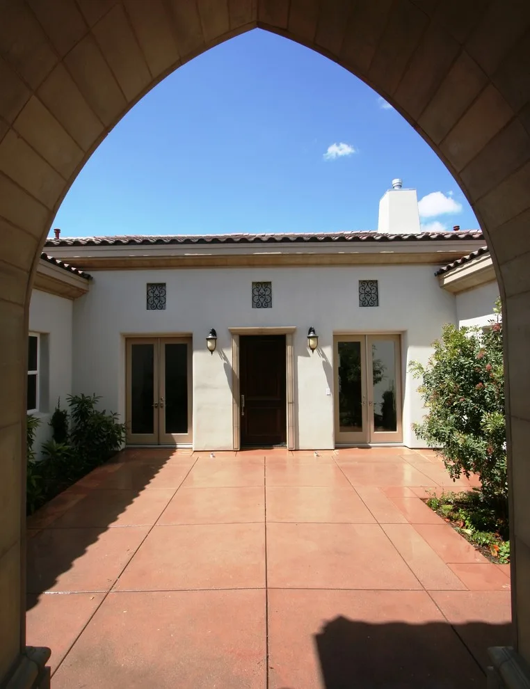Italian Villa Courtyard by Sweaney Custom Homes, Inc. - Photo 11