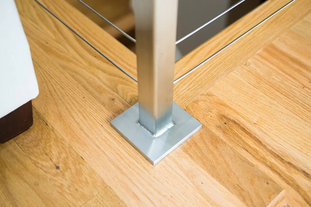 Stainless Steel Cable and Walnut Handrail Project by Labra Design Build - Photo 3