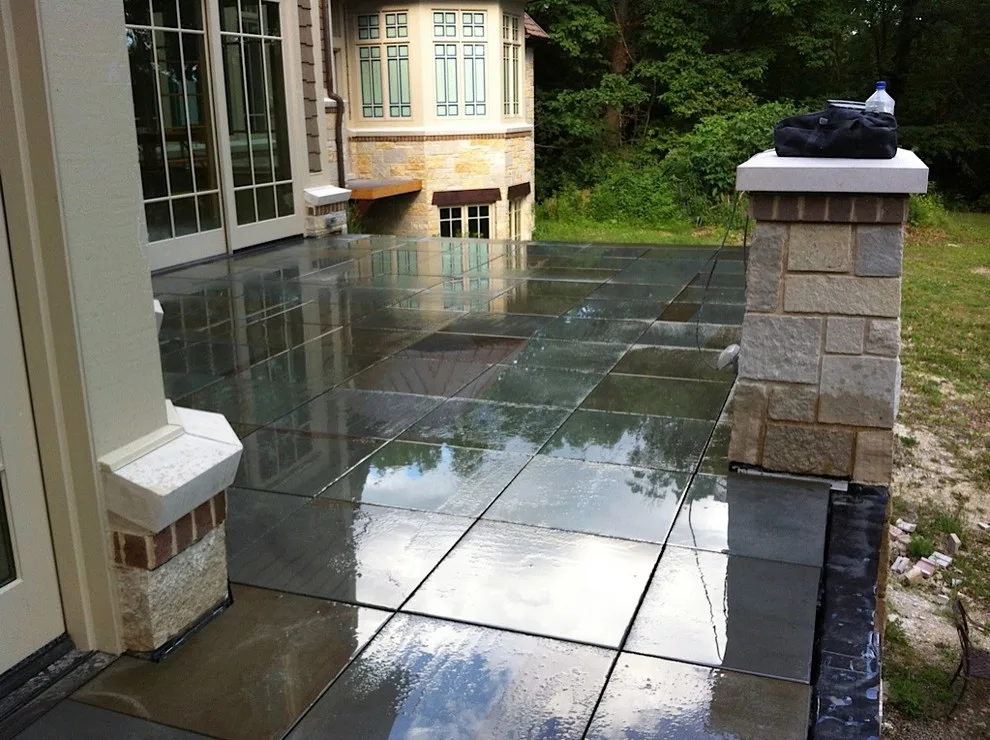 Bluestone outdoor flooring by Nest Construction - Photo 2