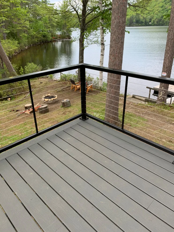 Decking with cable railing composite material by Nightingale Carpentry And Painting LLC - Photo 2
