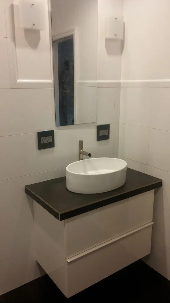 Adams bathroom and basement renovation by Norwegian Wood - Photo 7