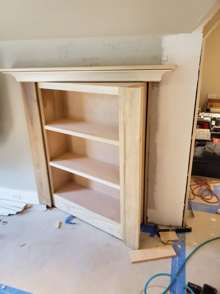 Concealed Storage Bookshelf by Multi Drywall & Partition, LLC - Photo 3