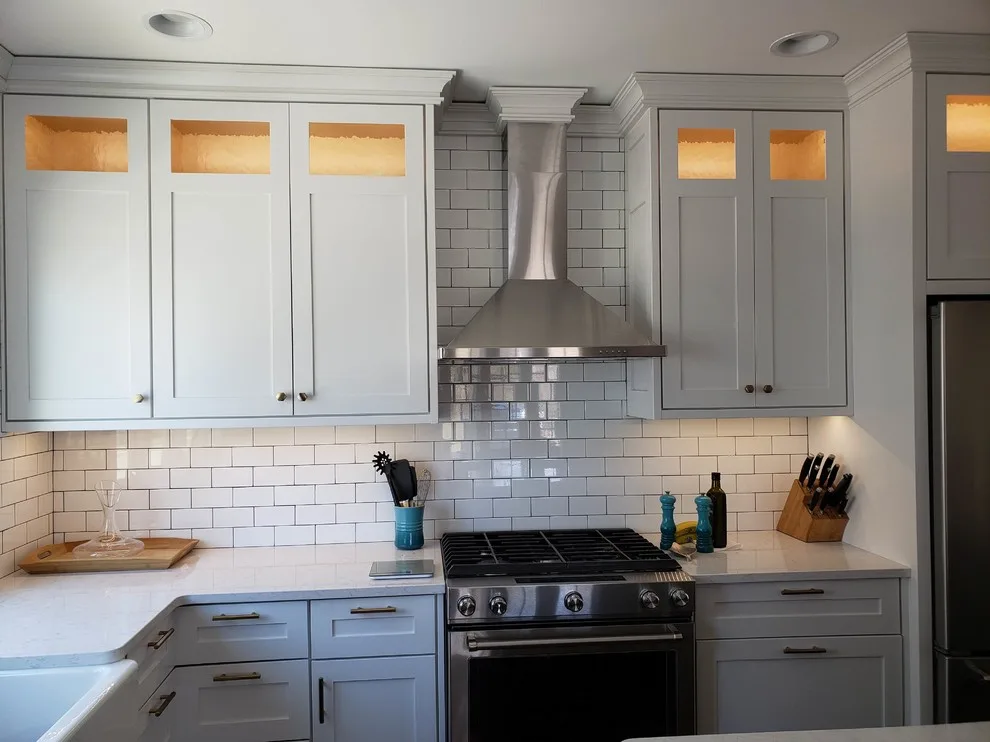 Open Concept Dining Room Project with White Kitchen and Blue Island by CJC Carpentry, LLC - Photo 8