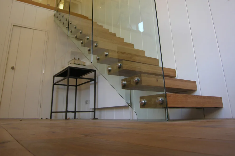 Contemporary Stairways by Alpha Woodwork Inc. - Photo 17