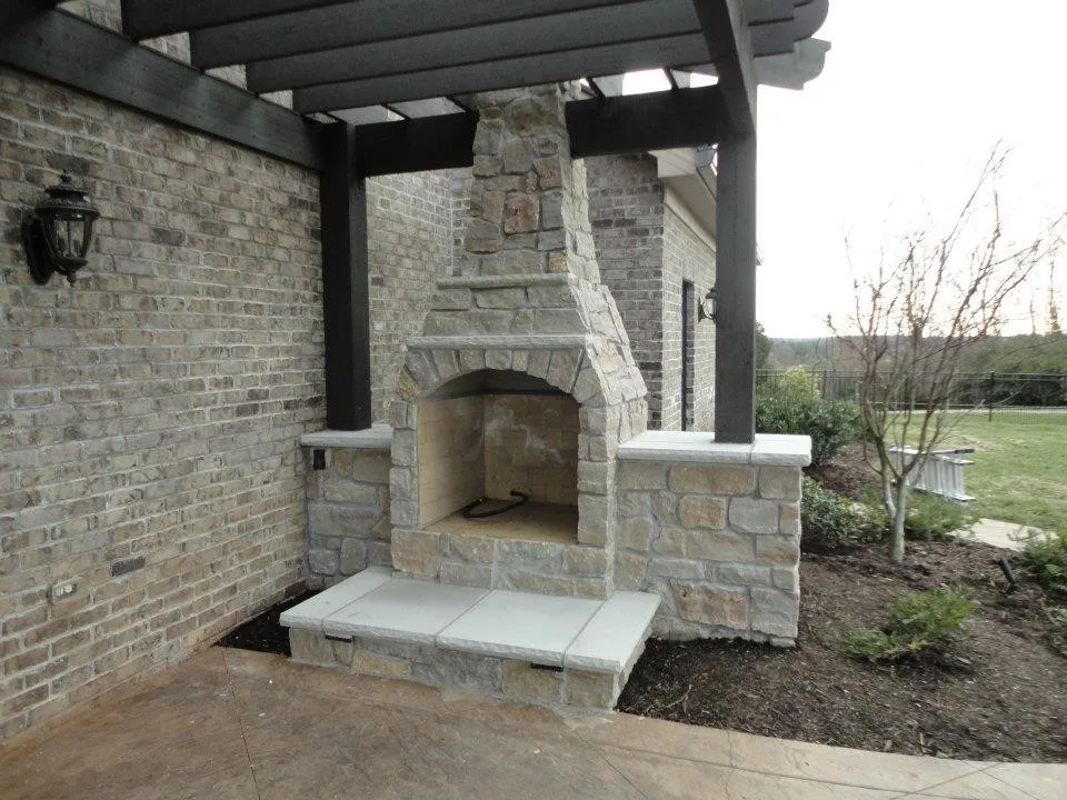 Outdoor fireplace pergola by Wildwood Land Design - Photo 4