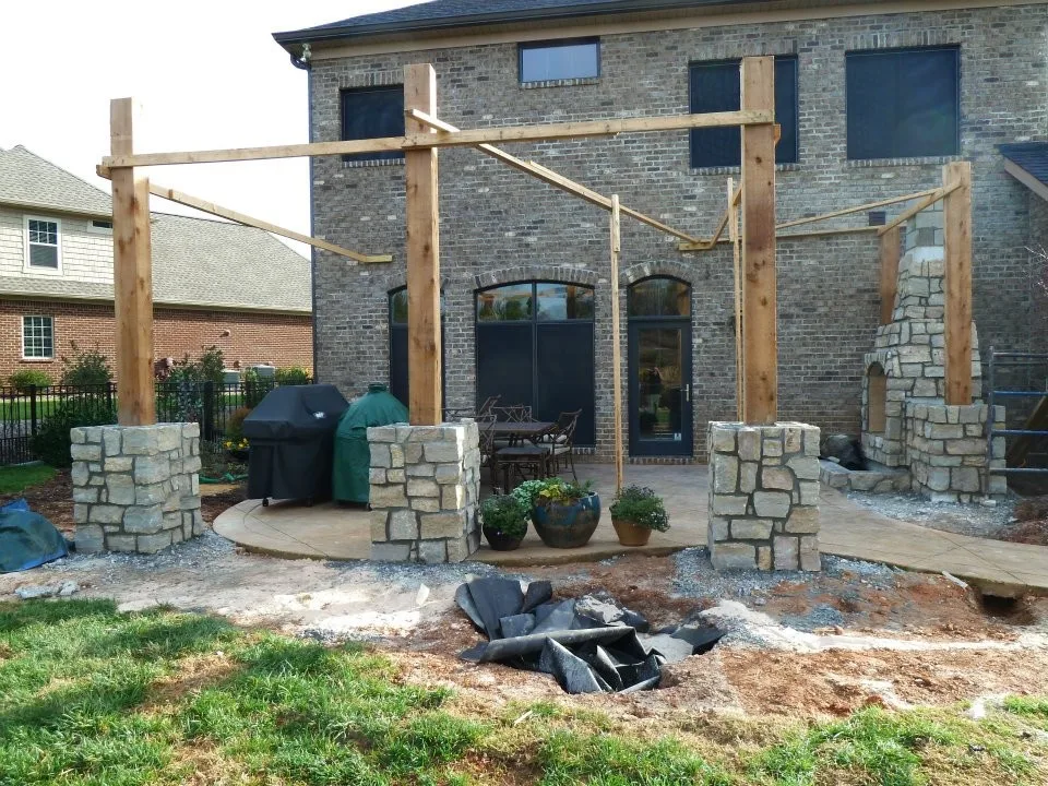 Outdoor fireplace pergola by Wildwood Land Design - Photo 5