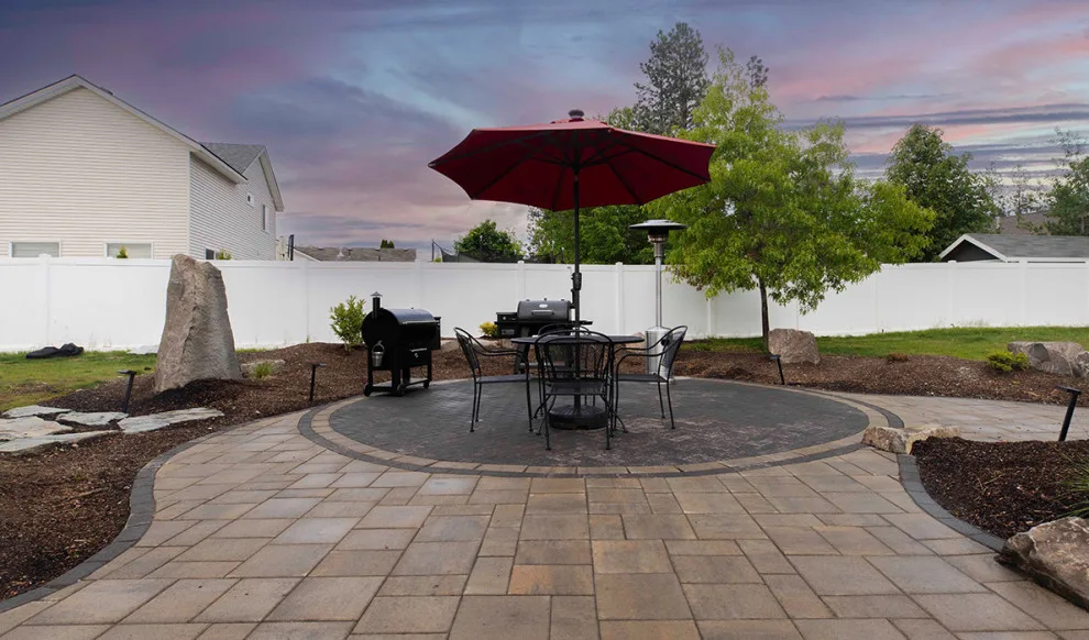 Patio on the hillside with a scenic view by Cross Creek Landscape Design + Build - Photo 3