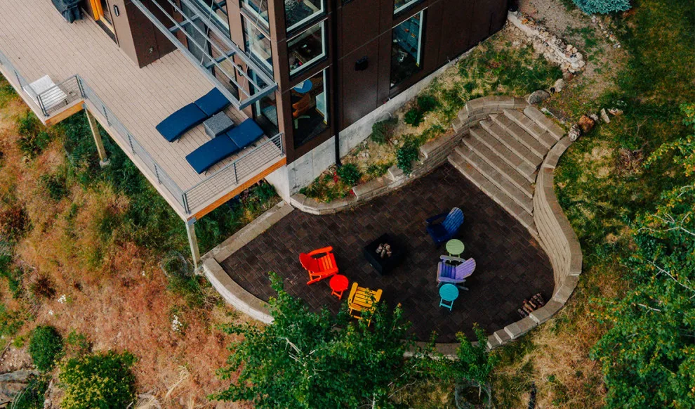 Patio on the hillside with a scenic view by Cross Creek Landscape Design + Build - Photo 7