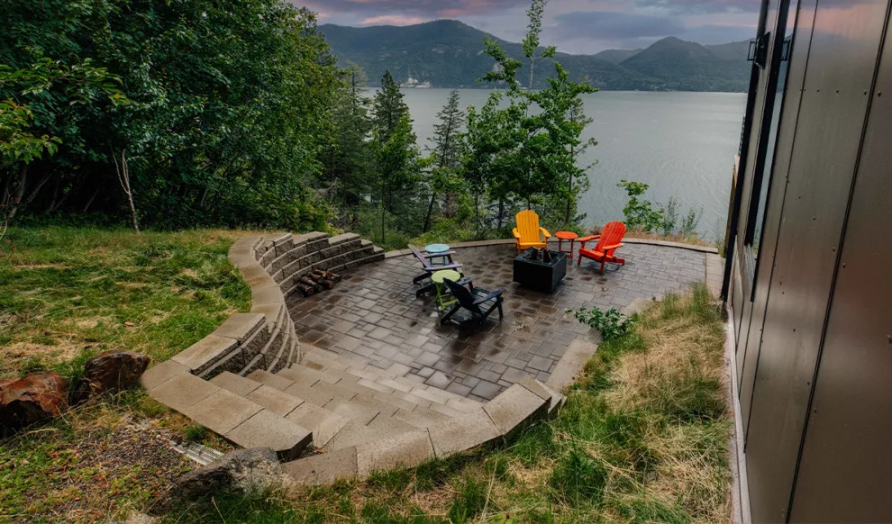 Patio on the hillside with a scenic view by Cross Creek Landscape Design + Build - Photo 2