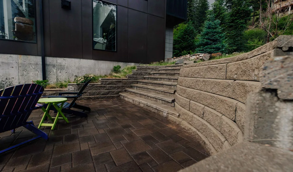 Patio on the hillside with a scenic view by Cross Creek Landscape Design + Build - Photo 5