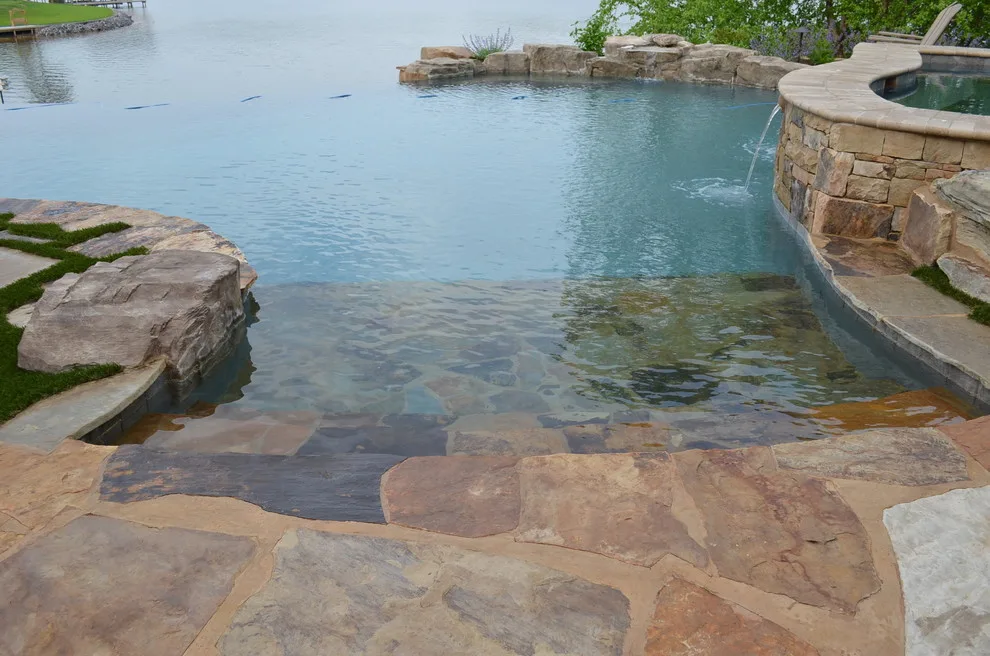 Infinity Edge Pool Lake Property by The Easy Gardener - Photo 5