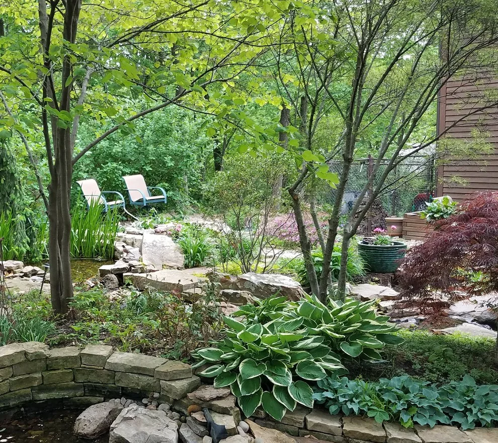 Wooded Hillside at Lake Quivira by Creative Outdoor Spaces - Photo 2