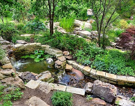 Wooded Hillside at Lake Quivira by Creative Outdoor Spaces - Photo 7
