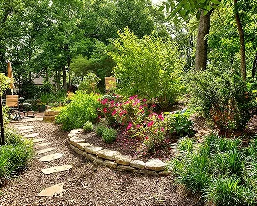 Wooded Hillside at Lake Quivira by Creative Outdoor Spaces - Photo 9
