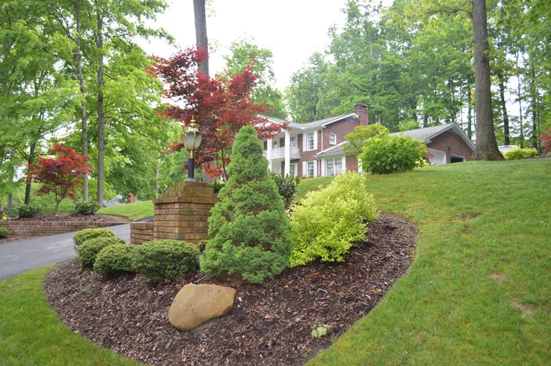 Front Yard with Landscaping by Promier Landscapes - Photo 17
