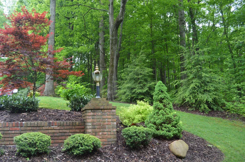 Front Yard with Landscaping by Promier Landscapes - Photo 15