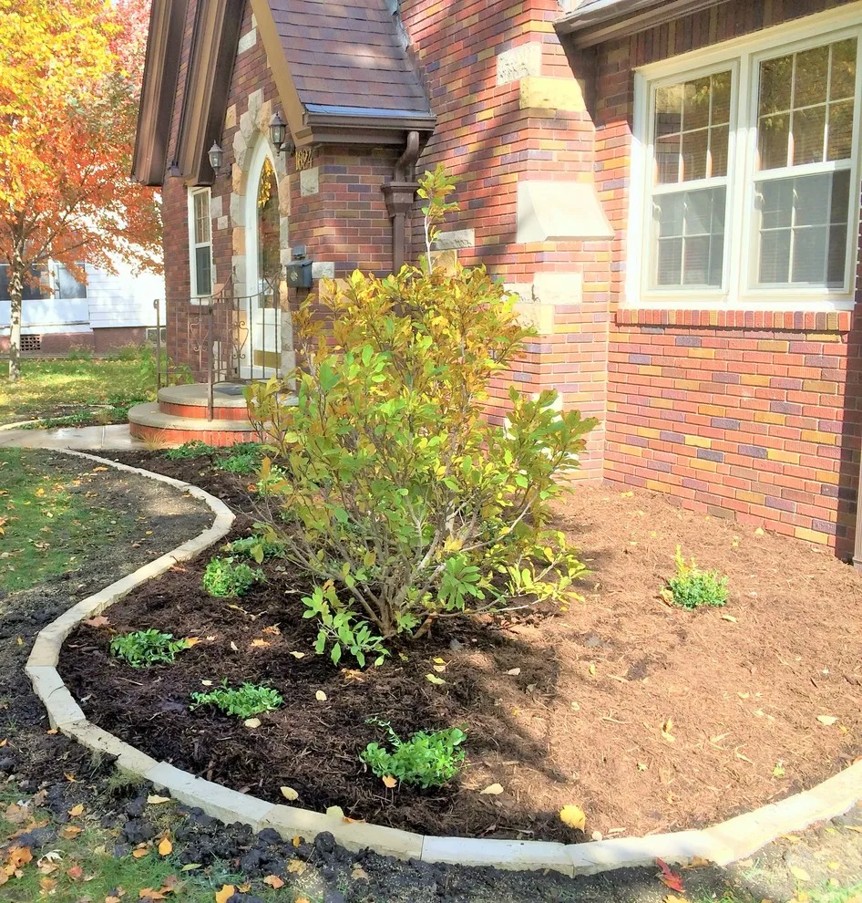 Limestone border planting foundation by Stony Creek Landscapes - Photo 3