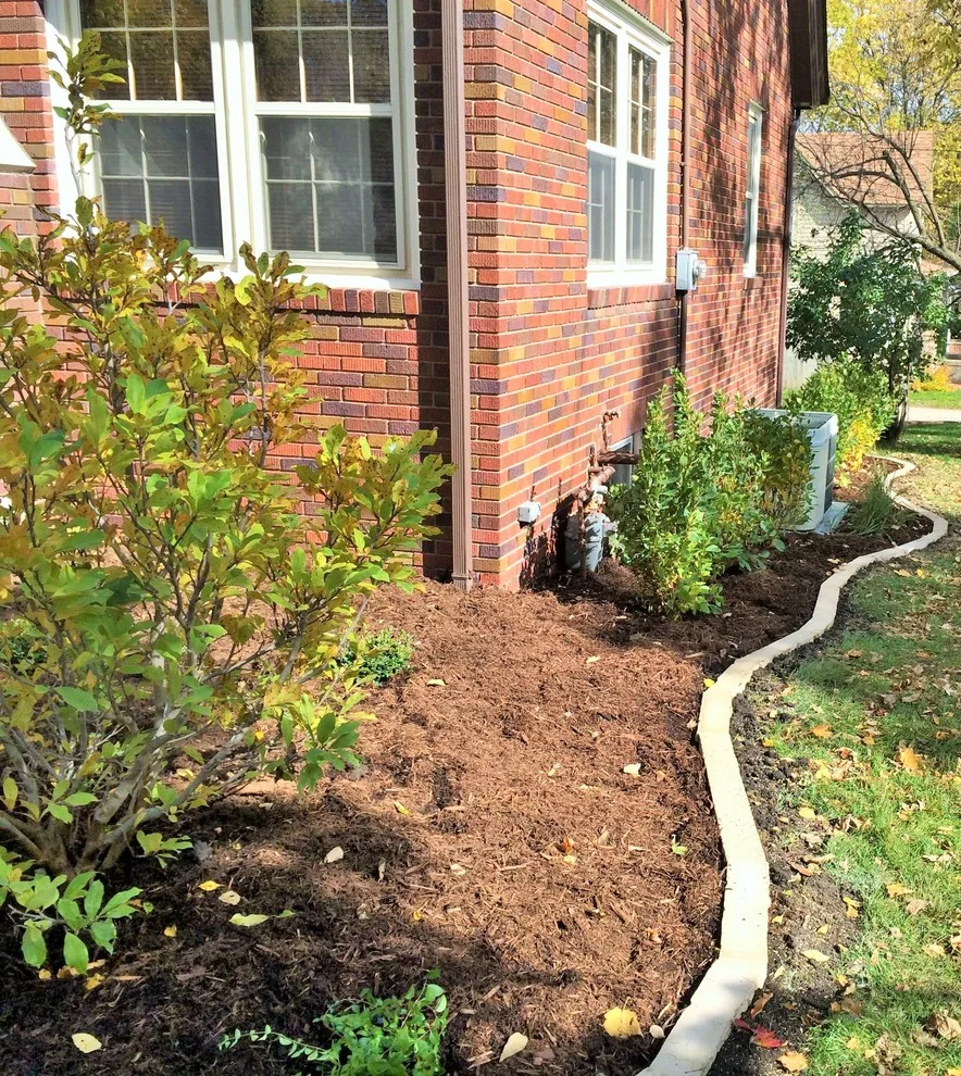 Limestone border planting foundation by Stony Creek Landscapes - Photo 2