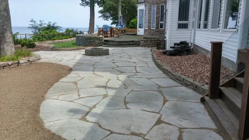 Custom Fire Pit and Natural Stone Patio by Twin Oaks Lawn And Landscape, Inc. - Photo 6