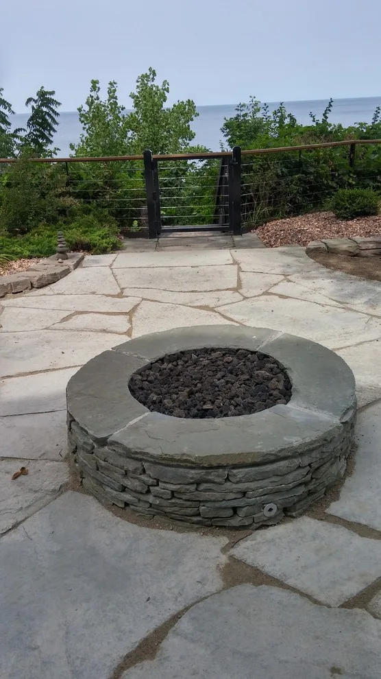 Custom Fire Pit and Natural Stone Patio by Twin Oaks Lawn And Landscape, Inc. - Photo 4