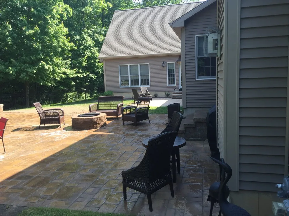 Patio Pool Deck with Seating Wall and Fire Pit by Arborcare Landscape Services & Products, LLC. - Photo 4