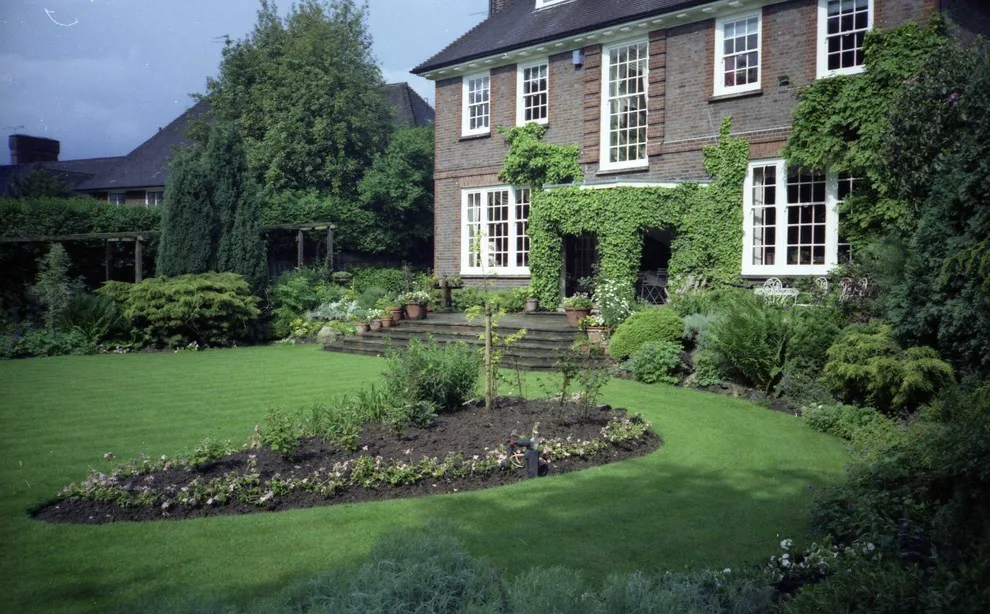 A renovated garden by English Landscape LLC - Photo 10