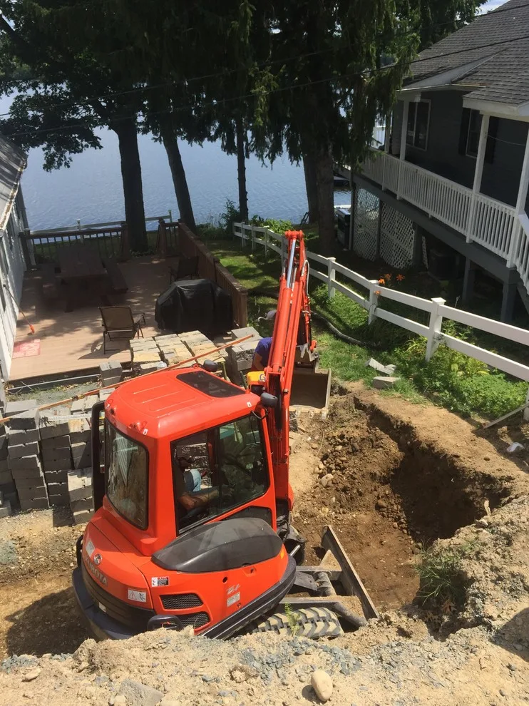 Substitution of Layered Segmented Concrete Block Retaining Wall by Arborcare Landscape Services & Products, LLC. - Photo 19