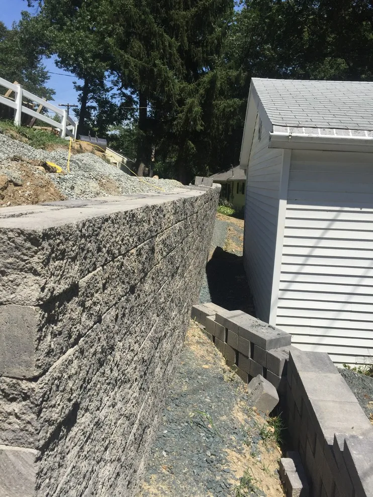 Substitution of Layered Segmented Concrete Block Retaining Wall by Arborcare Landscape Services & Products, LLC. - Photo 17