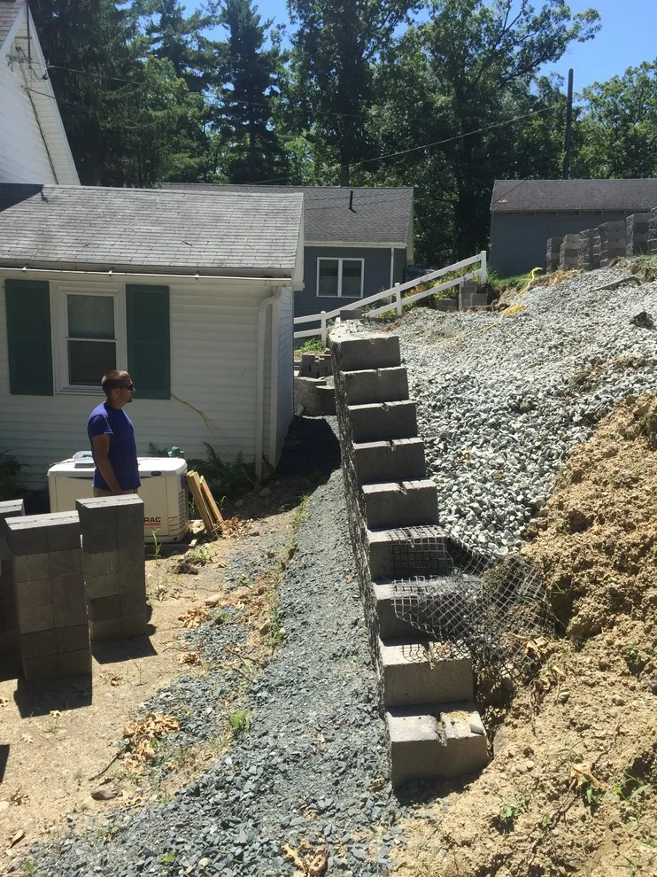 Substitution of Layered Segmented Concrete Block Retaining Wall by Arborcare Landscape Services & Products, LLC. - Photo 9
