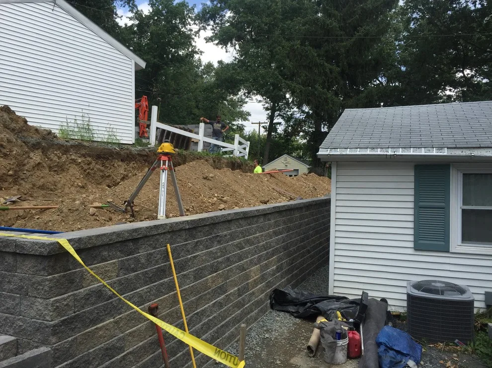 Substitution of Layered Segmented Concrete Block Retaining Wall by Arborcare Landscape Services & Products, LLC. - Photo 4