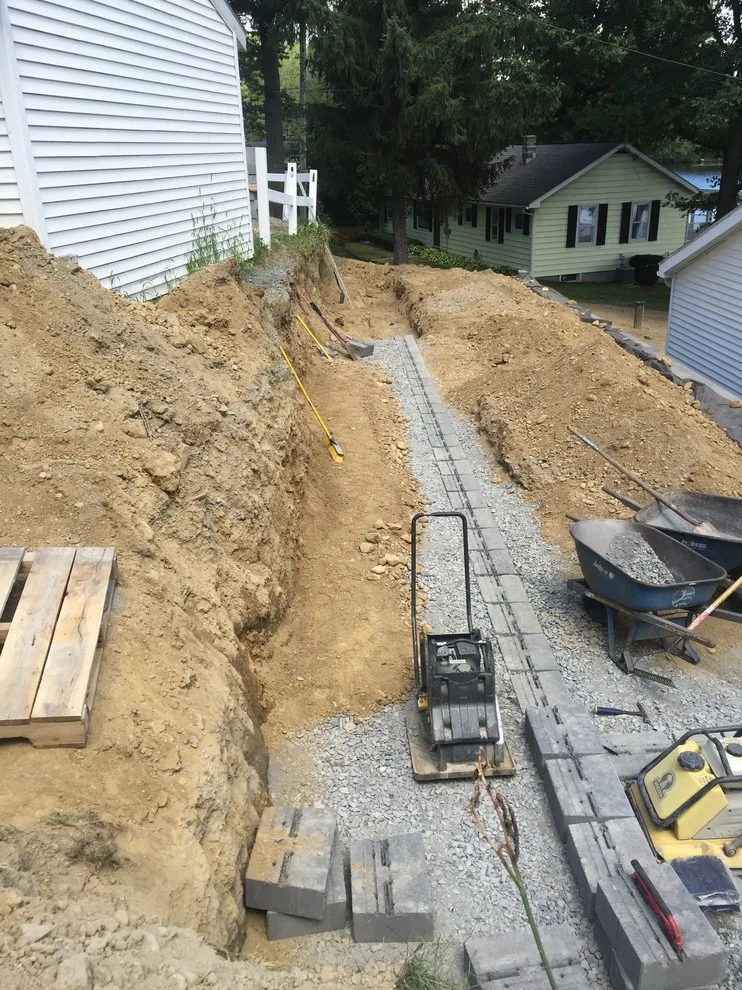 Substitution of Layered Segmented Concrete Block Retaining Wall by Arborcare Landscape Services & Products, LLC. - Photo 11
