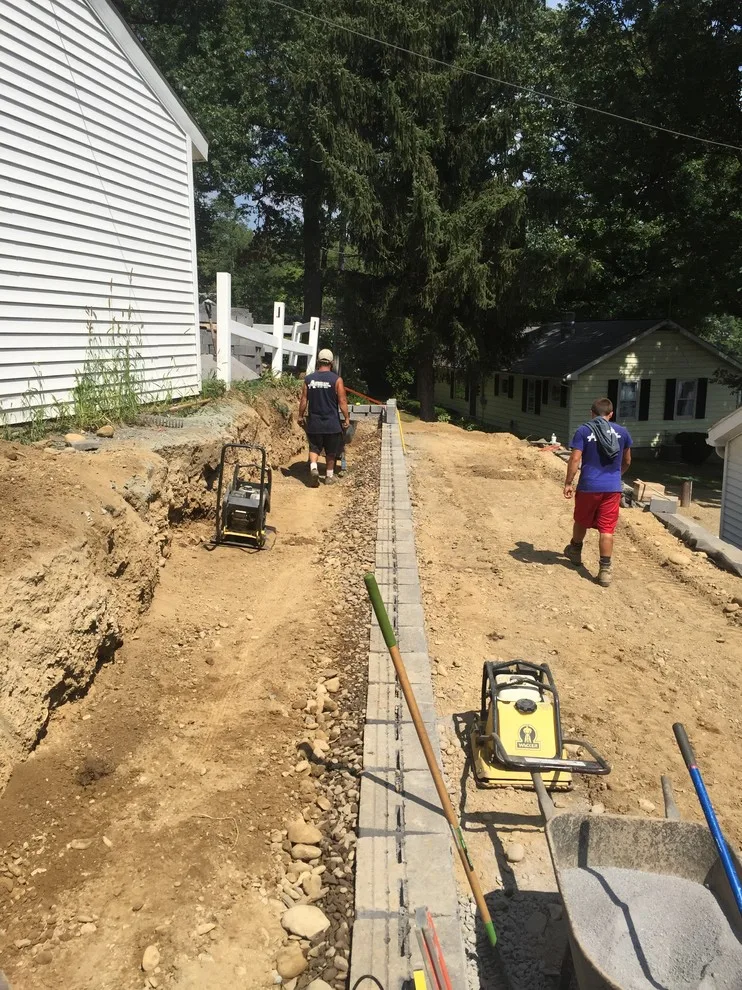 Substitution of Layered Segmented Concrete Block Retaining Wall by Arborcare Landscape Services & Products, LLC. - Photo 8