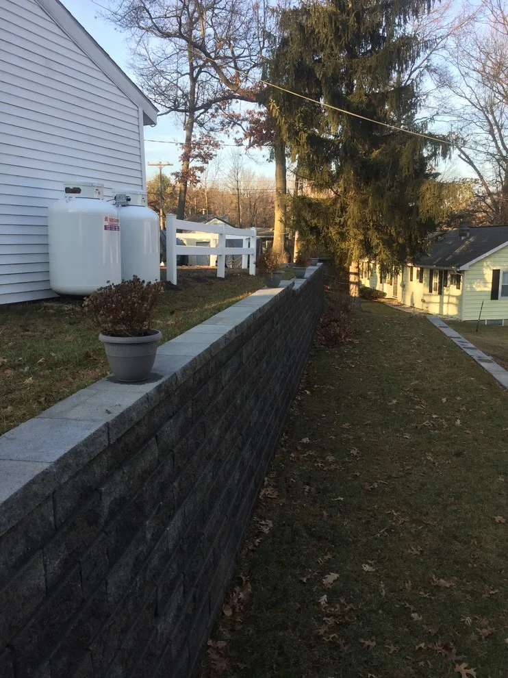 Substitution of Layered Segmented Concrete Block Retaining Wall by Arborcare Landscape Services & Products, LLC. - Photo 5