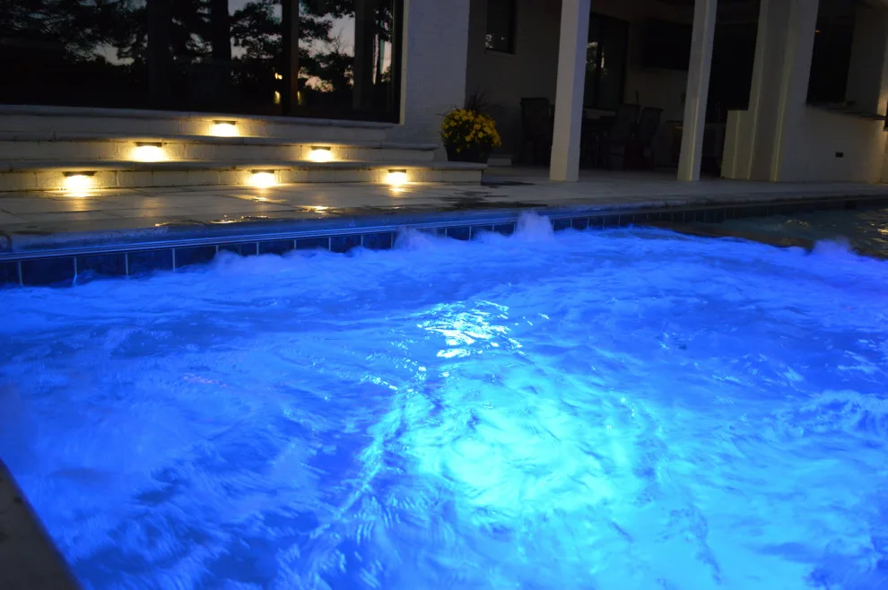 Elegant Pool and Outdoor Cooking Area by Carex Design Group - Photo 16