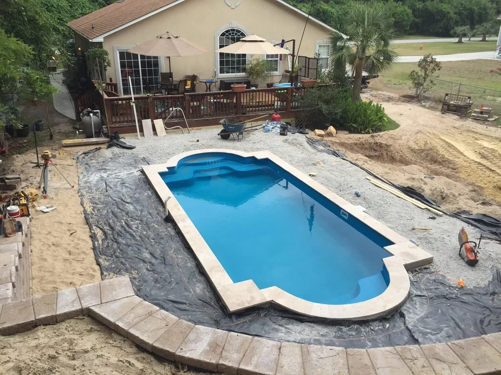 Retaining Wall and Landscaping for Travertine Pool Deck by Yardworks, Inc. - Photo 11