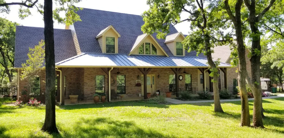 Metal, Composition, and Tile Roofing Solutions by Swan Roofing, LLC - Photo 14