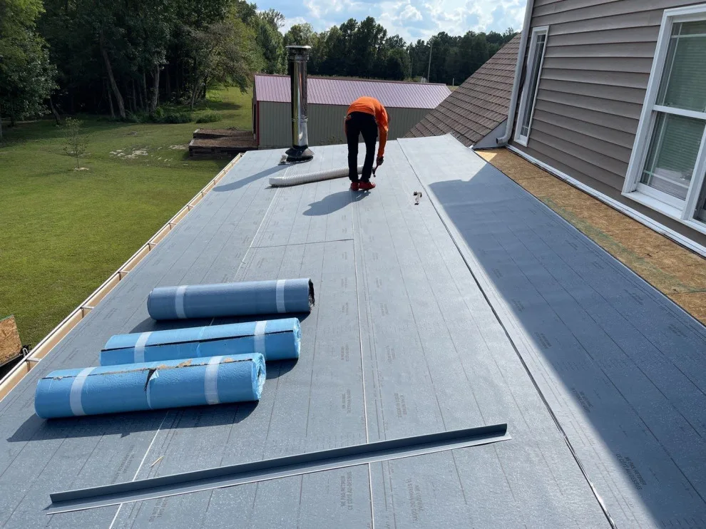 Installation of flat roofing by Roof MD - Photo 2