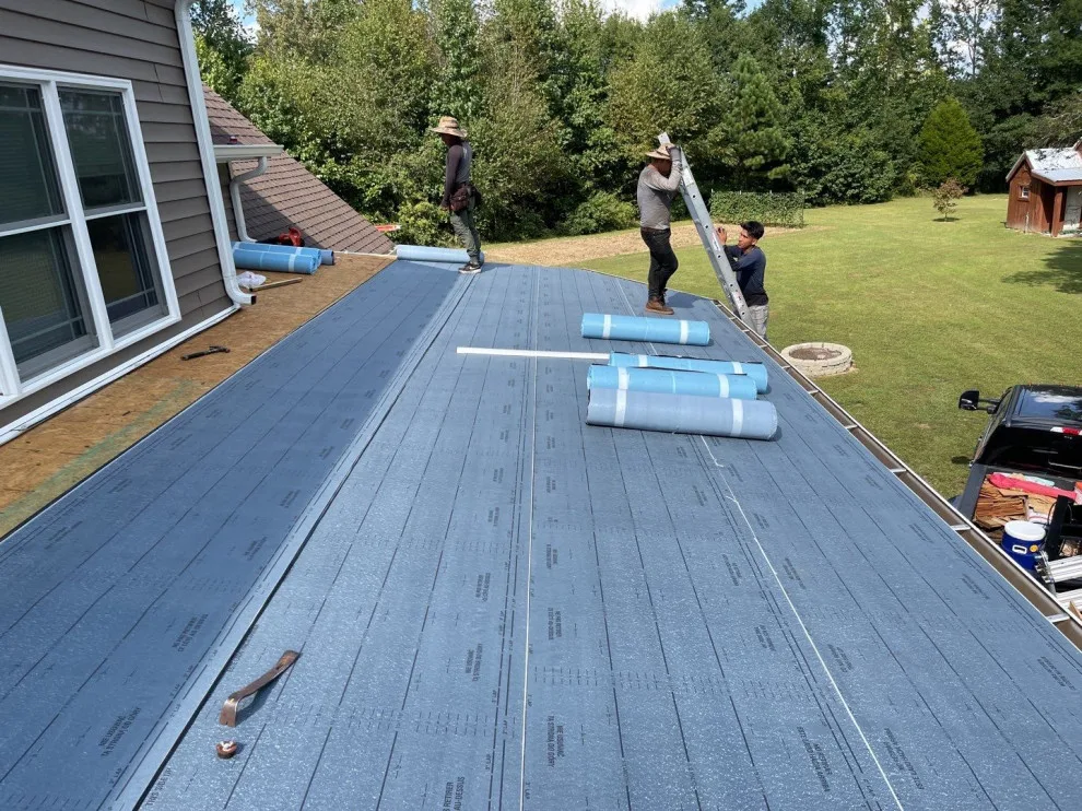 Installation of flat roofing by Roof MD - Photo 5