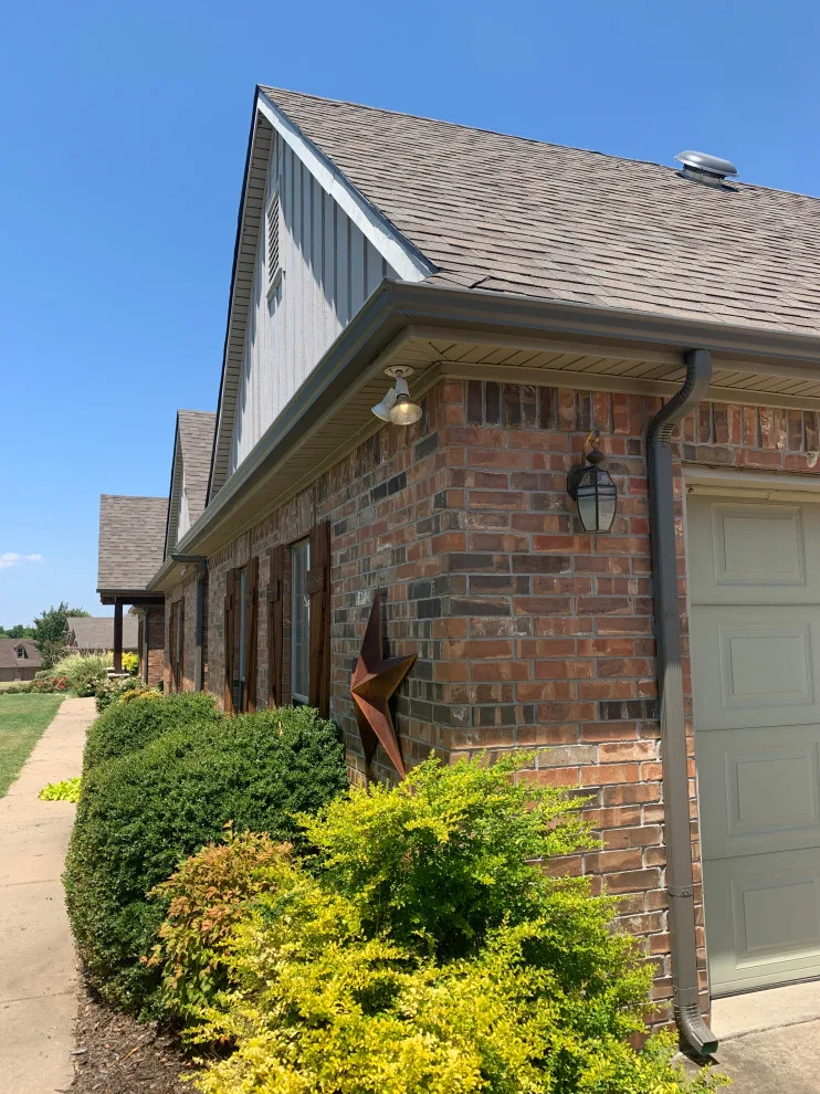 Replacement of outdated clay color system with new Terra bronze gutter by Sharp Seamless Gutter - Photo 6