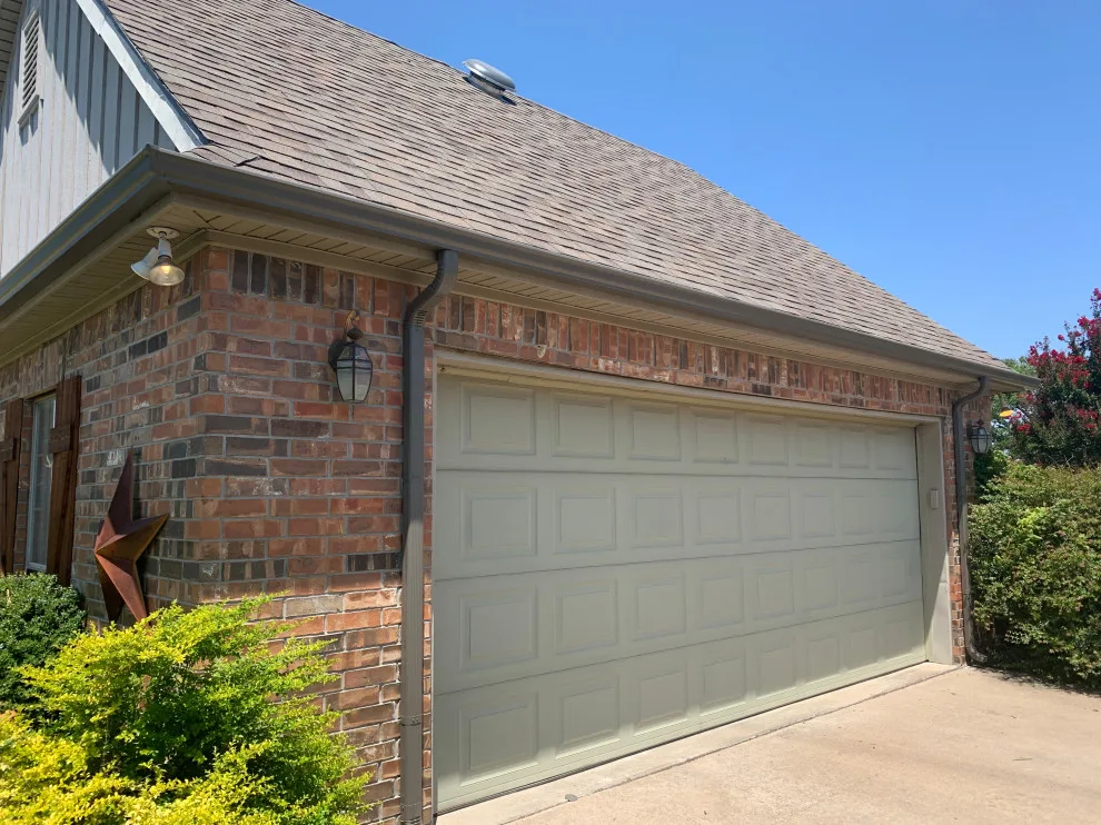 Replacement of outdated clay color system with new Terra bronze gutter by Sharp Seamless Gutter - Photo 2