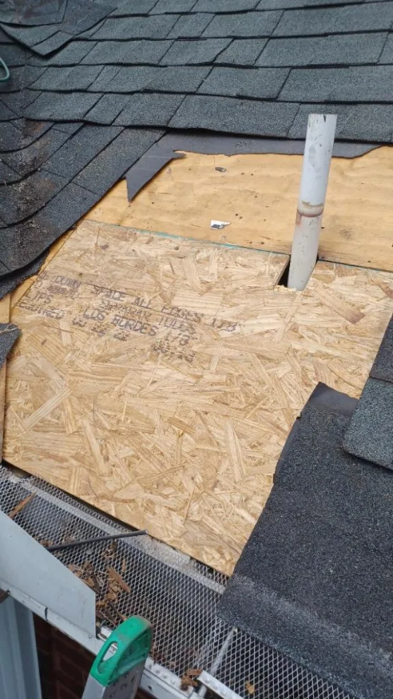 Damaged sheathing and leaking plumbing vent by Roof MD - Photo 4