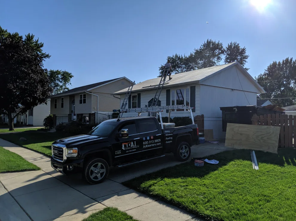 Roof replacement assembly by AJ Exteriors & Roofing Inc. - Photo 6