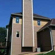 Home Siding Projects by NMC Exteriors & Remodeling - Photo 31