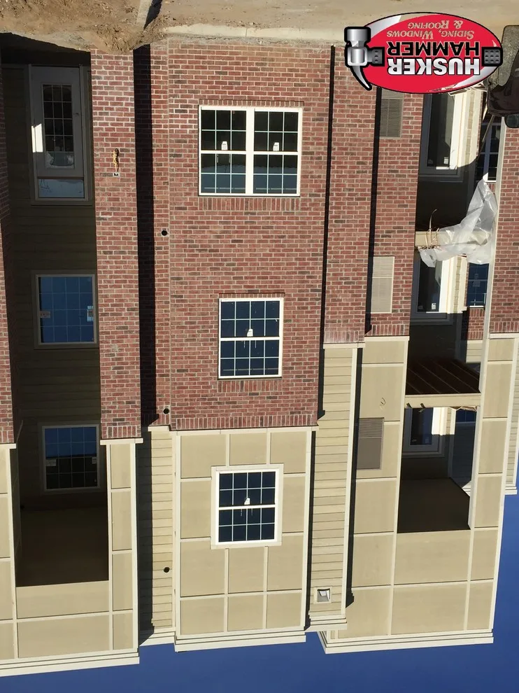 Husker Hammer Siding Windows And Roofing - Photo 11