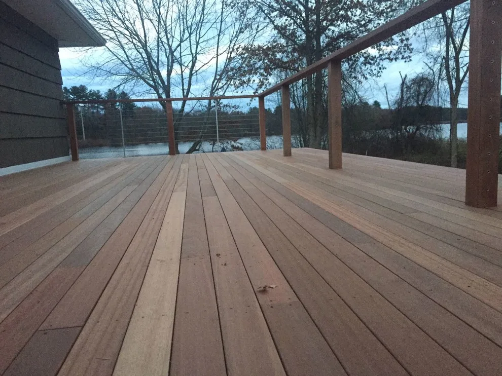 Tailored Mahogany Deck Featuring CableRail System by Loyalty Exterior Solutions - Photo 35