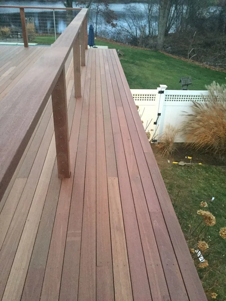 Tailored Mahogany Deck Featuring CableRail System by Loyalty Exterior Solutions - Photo 23