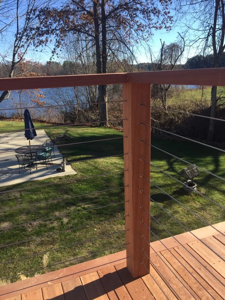 Tailored Mahogany Deck Featuring CableRail System by Loyalty Exterior Solutions - Photo 33