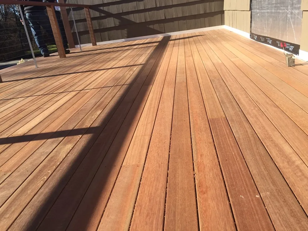 Tailored Mahogany Deck Featuring CableRail System by Loyalty Exterior Solutions - Photo 27